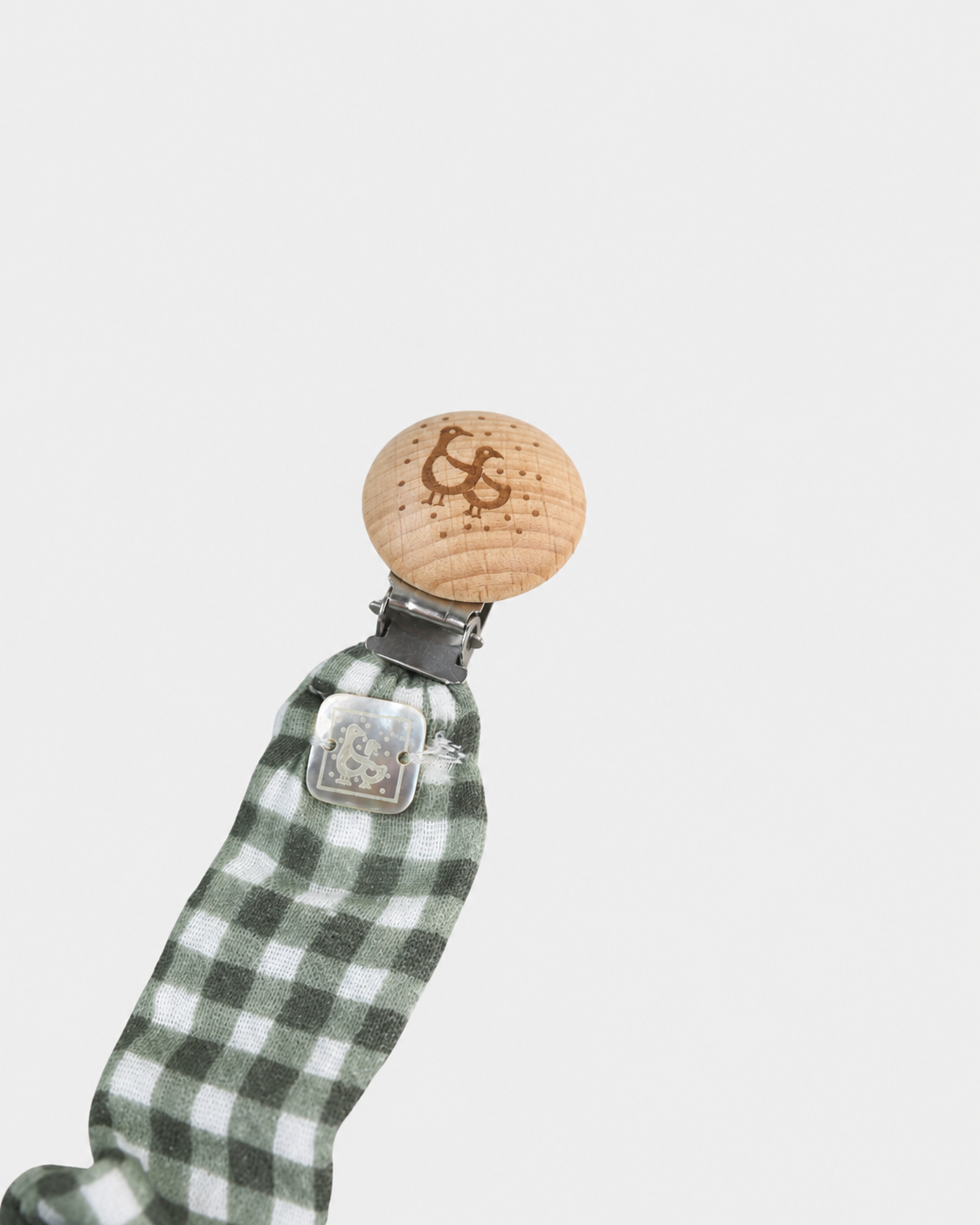 Ciuccio con clip a quadretti beige e stella